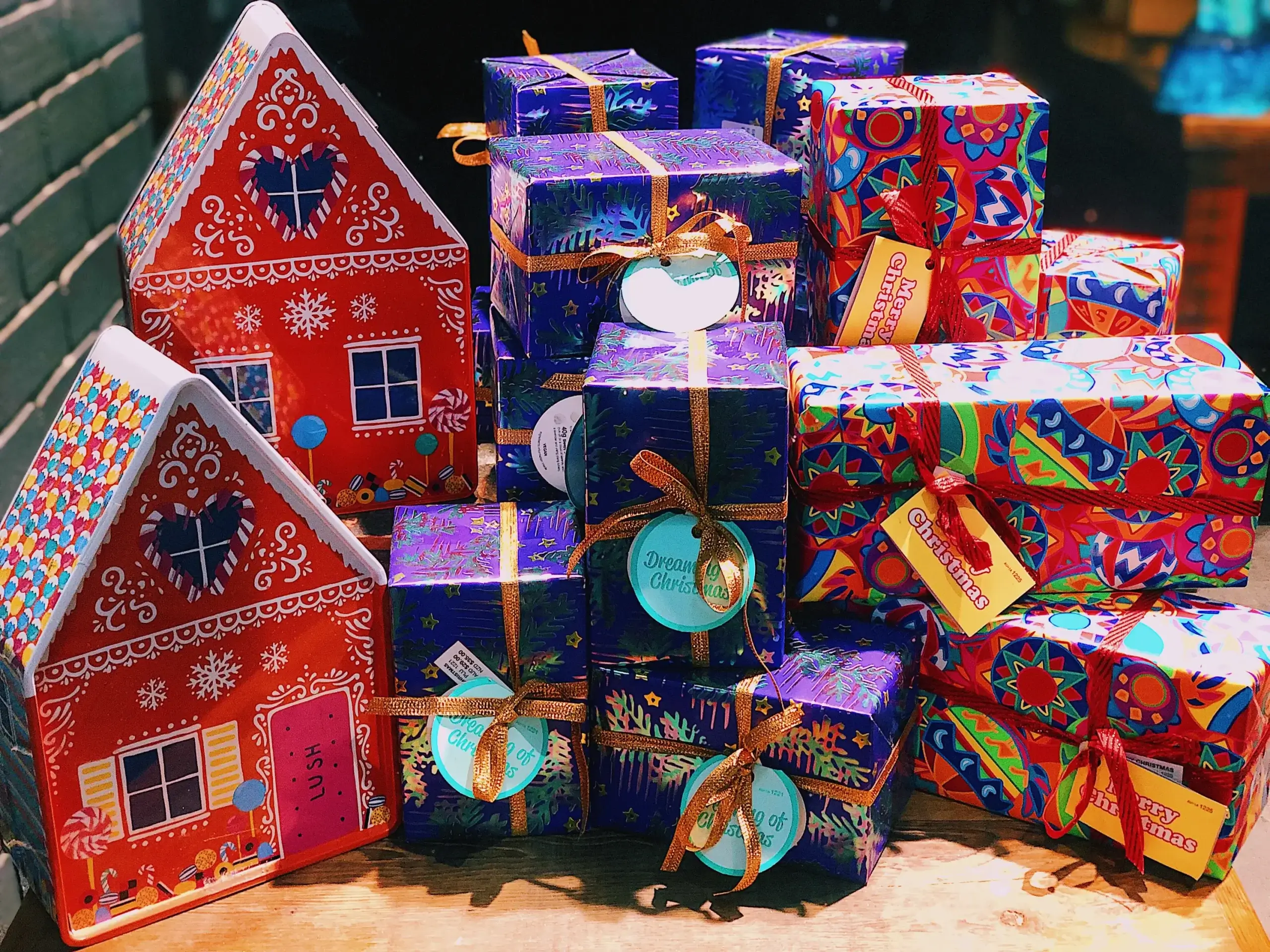 Colorful gift boxes and decorative packaging displayed inside a modern gift shop